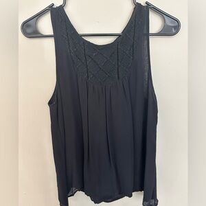 Size small black lucky brand top with open back and detailing